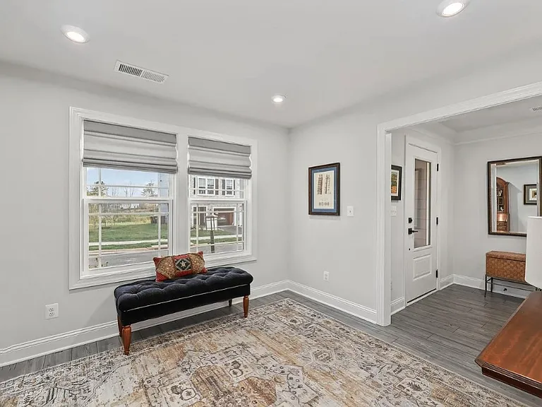 Inside front door, home office or 4th bedroom area