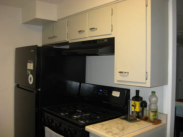 Equipped kitchen, range, refrigerator, dishwasher, disposal.
