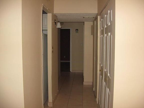 hallway to bedrooms and baths