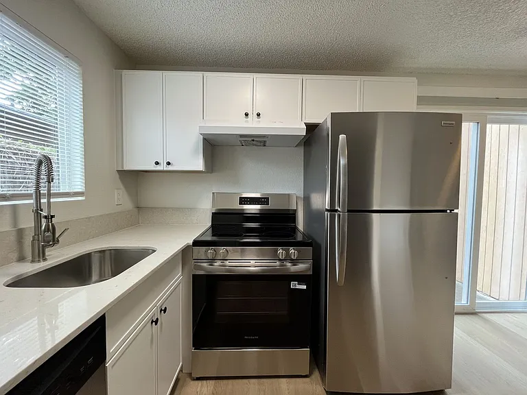 Inviting 2 Bedroom Home with Open Layout, Stainless Steel Appliances & Private Outdoor Retreat — Photo 5