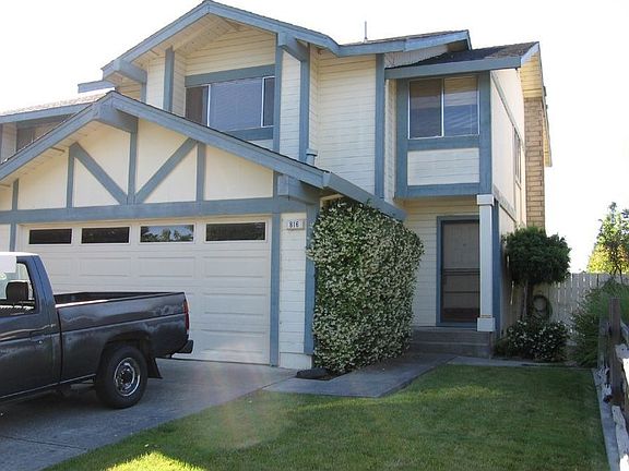 Easy care front yard.  Automatic garage door.