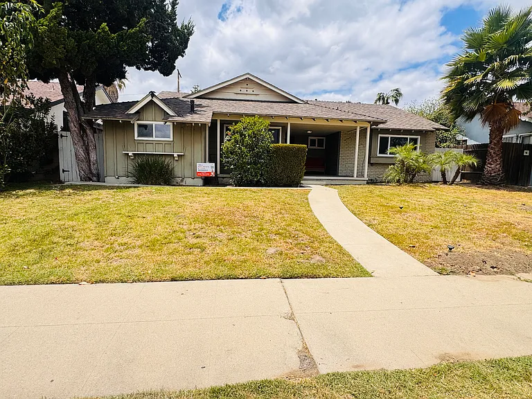 9327 Woodley Ave — Photo 1