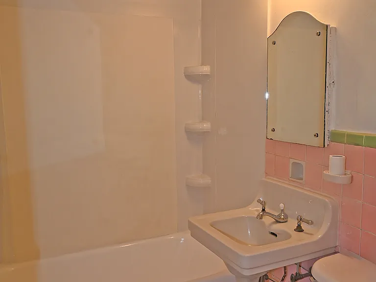 Bathroom original tiles sink, and medicine cabinet from 1928.