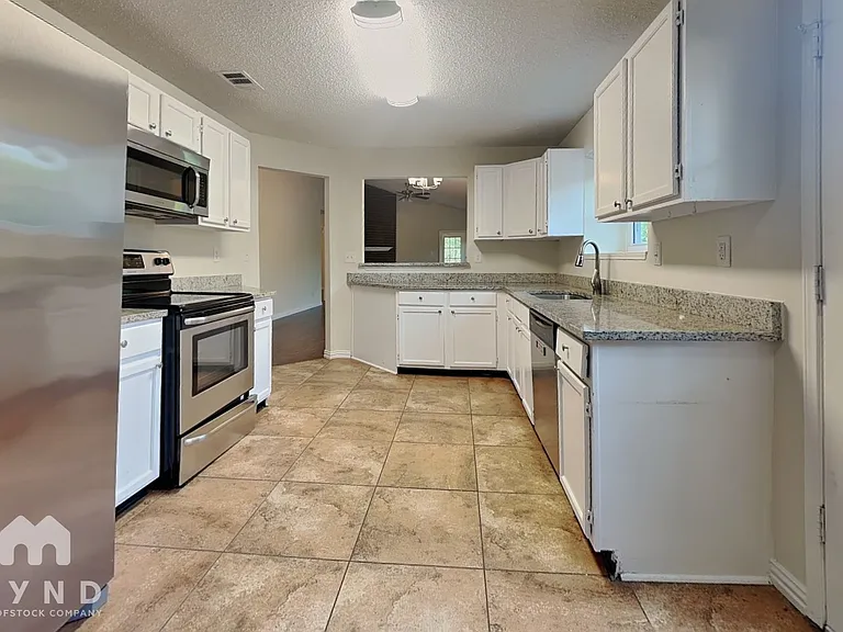 8704 Tigris Trl — Photo 7