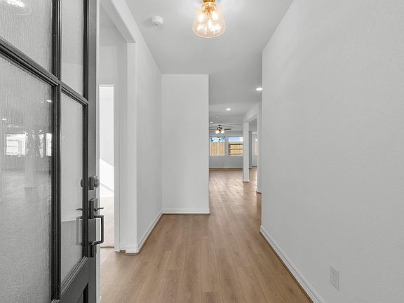 Welcome home! Step inside through the inviting entryway that seamlessly flows into the open-concept