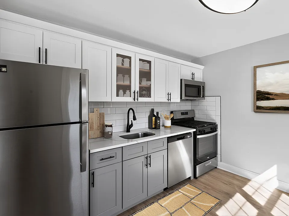Unveil the modern charm of Eagle Rock Apartments at Woodbury. This stunning kitchen features sleek stainless appliances, elegant cabinetry, and ample space for culinary creativity. Elevate your living experience todayschedule a tour and see for yourself!