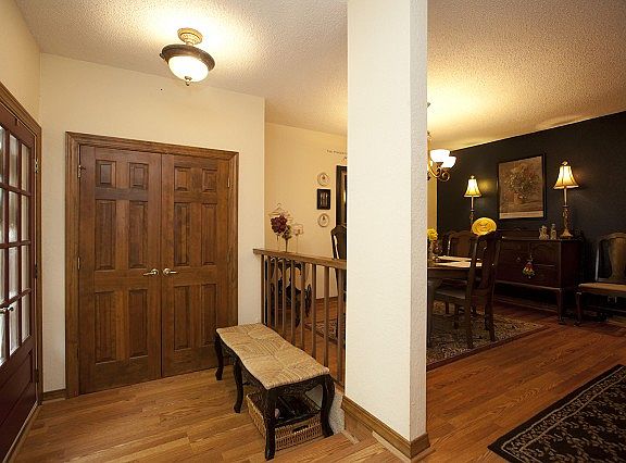 Wood veneer floor throughout