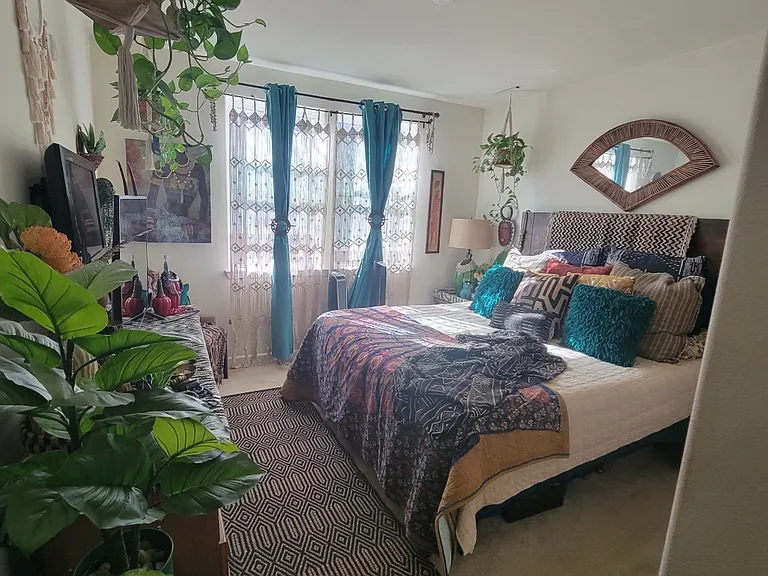 Very spacious 12x12-foot room comfortably fits a California King-sized bed (as pictured) with 4 feet of space remaining on each side of the bed