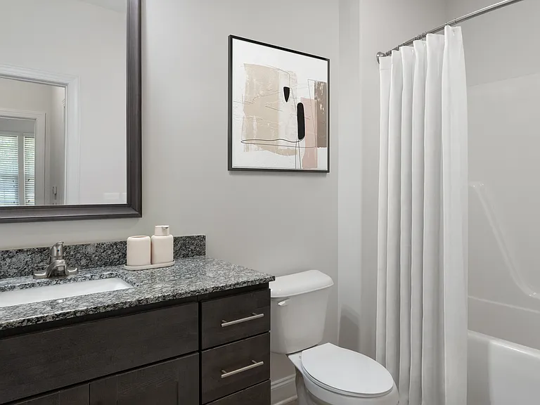 Bright and thoughtfully-designed bathrooms made for daily ease.