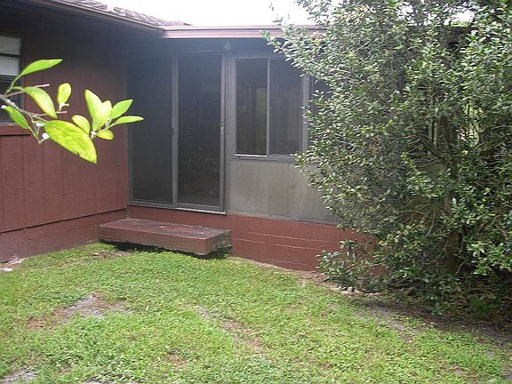 Exterior Rear / Enclosed Porch
