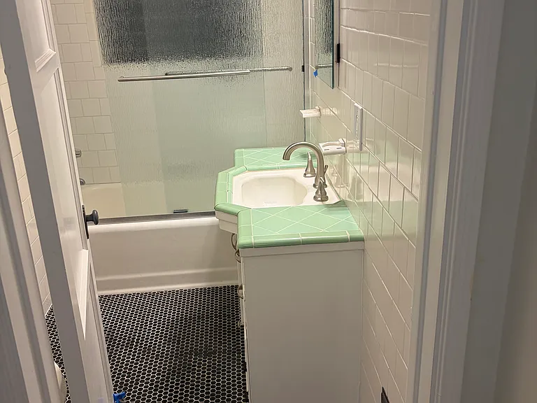 Bathroom with tub and shower
