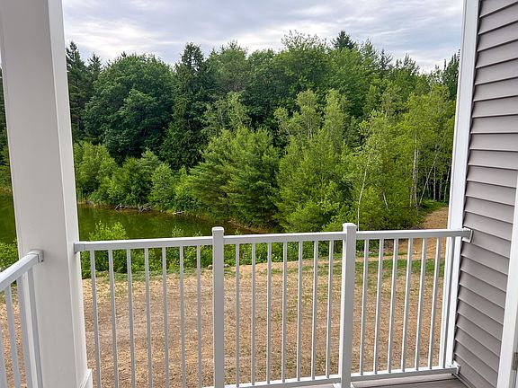 View of private pond & forest from private deck