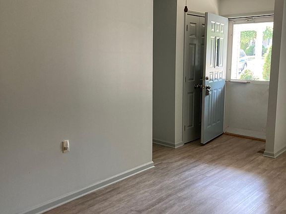 Front entryway with coat closet.