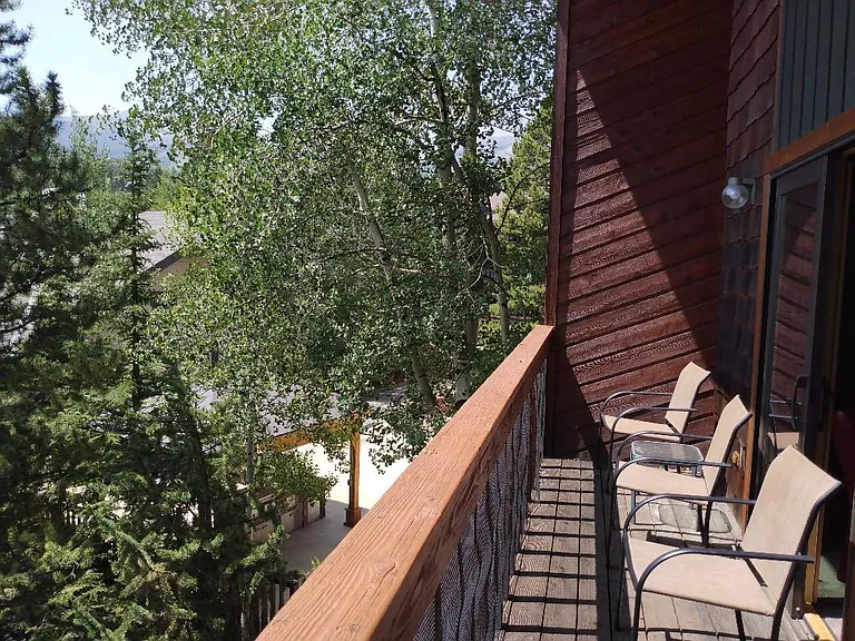 Sunny south facing deck with view of downtown