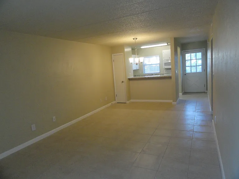 Living room and dining area with open floor plan