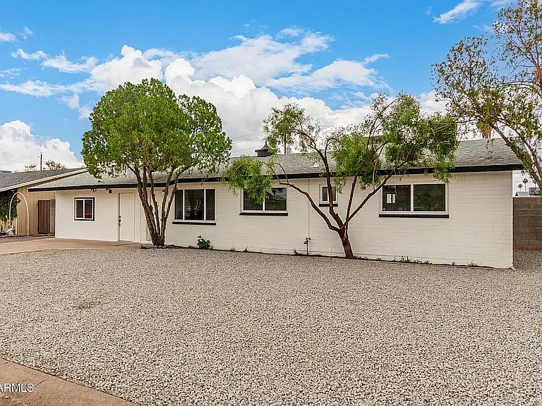 3939 W Harmont Dr — Photo 2
