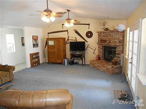 Another view of this spacious room which leads out into the backyard area.