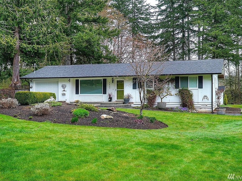 Picture perfect setting on beautifully manicured .75 acre lot