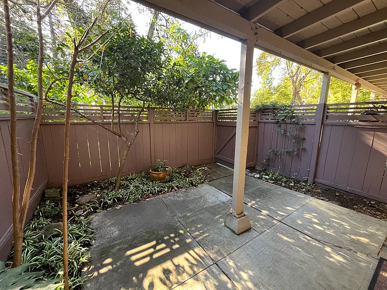 Private patio for a downstairs Jr 1BR apartment.