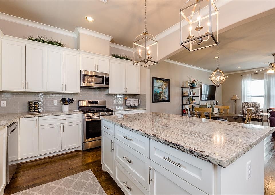 Fabulous 3/3.5/2 townhome in gated community in the desirable neighborhood of Oak Forest. This home boasts a balcony along with a large patio and private backyard.