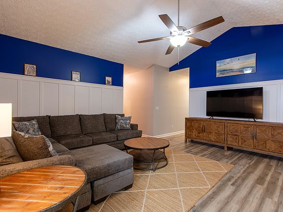Living Room - Large 65" Smart TV and games for kids