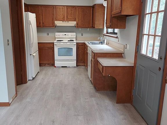Kitchen from eating area-which is open floot plan with great roo