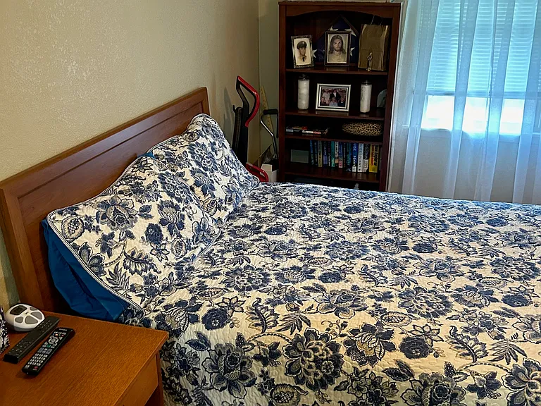 Bedroom easily fits queen with plenty of space. King sized bed will also fit.