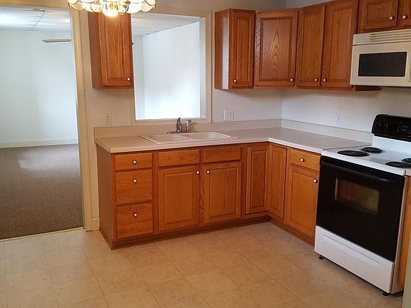 Kitchen looking into living room