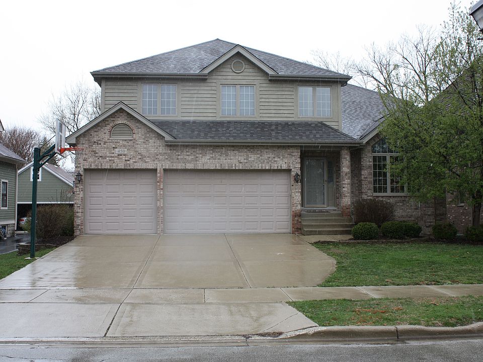 2 story brick with 3 car attached garage