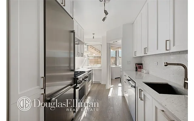 Sold by Douglas Elliman | media 18