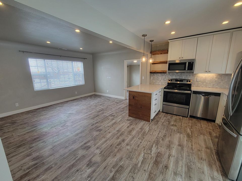 Open concept living room/dining area/kitchen