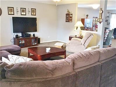 Lovely Home on a quiet street with 3 bedrooms, 2 1/2 baths, open concept layout, 2 car garage and fully fenced in back yard!