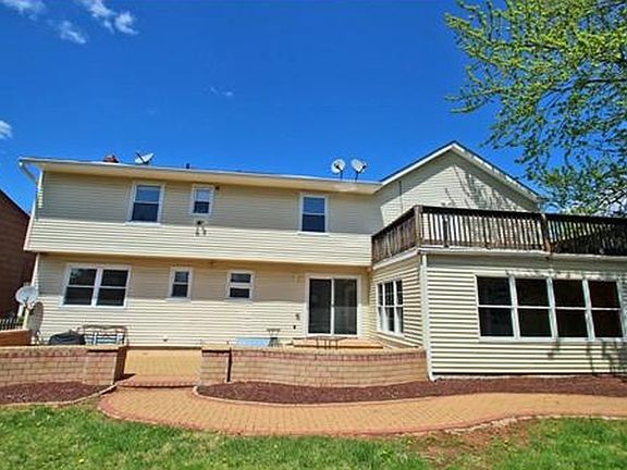 View from backyard : Pavers patio and 2nd floor balcony