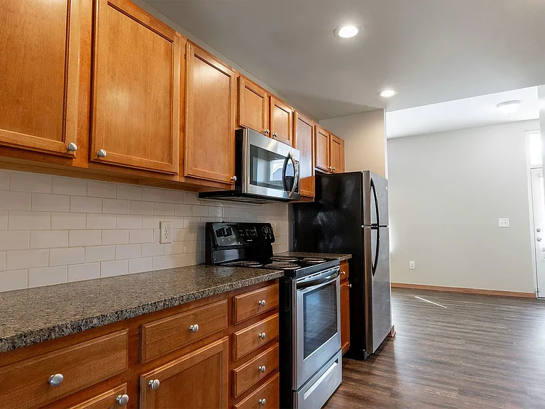 New Village Homes & Whitney Young Townhomes — Photo 7