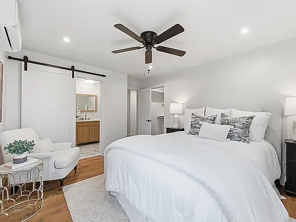 Bedroom 1 with on-suite marble bath and walk-in closet