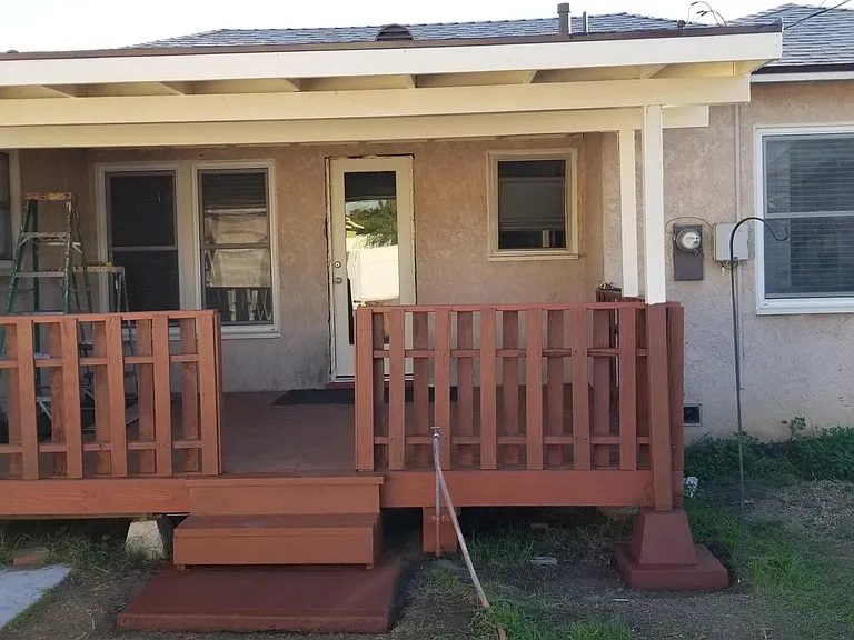 180 square foot covered wooden deck