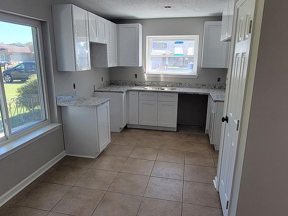 Brand New Kitchen Renovation:
Granite Countertops and New Stainless Steel Appliances