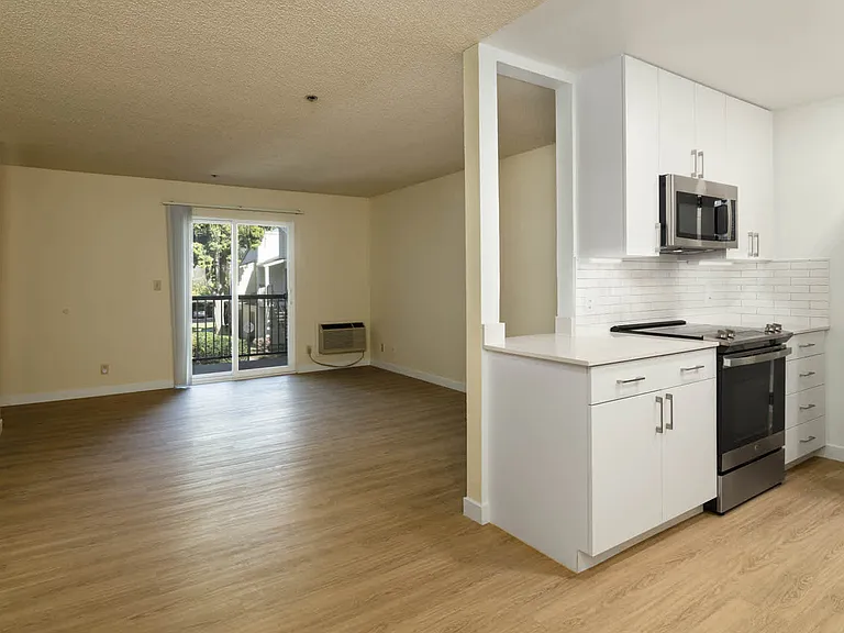 Living Room with Balcony and Hard Surface Flooring