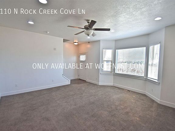 5th image of 8110 N Rock Creek Cove Ln