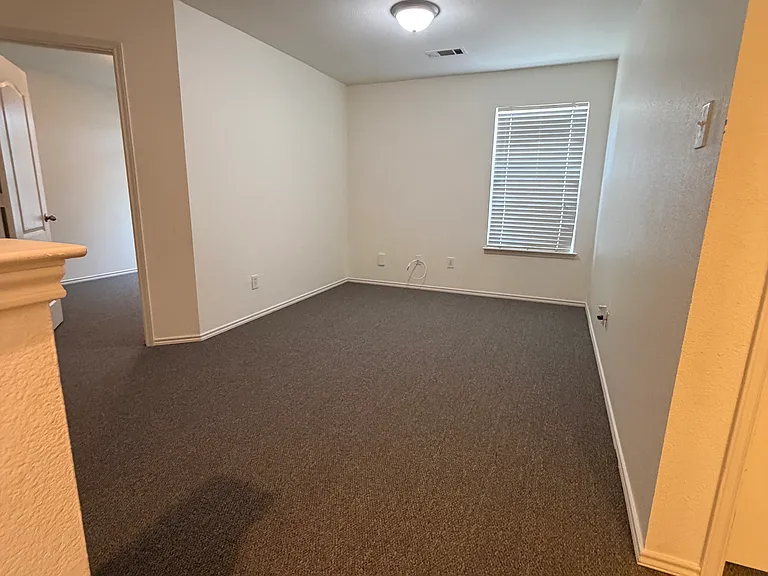 Upstairs landing. Great for a family room or office/work area