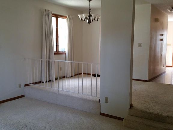 View from front door through living and dining rooms to kitc