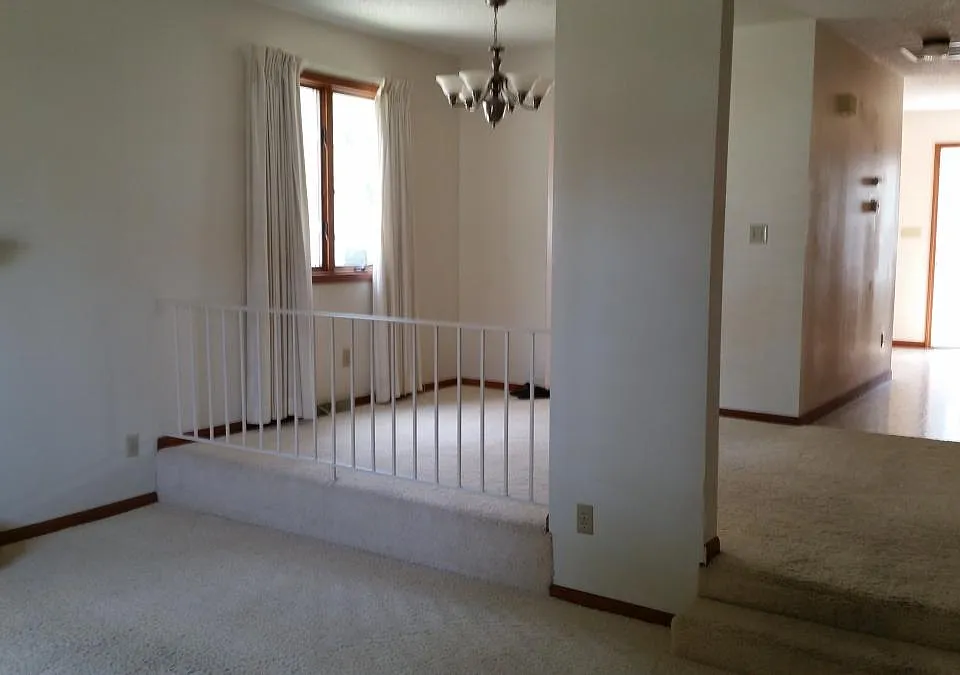 View from front door through living and dining rooms to kitc