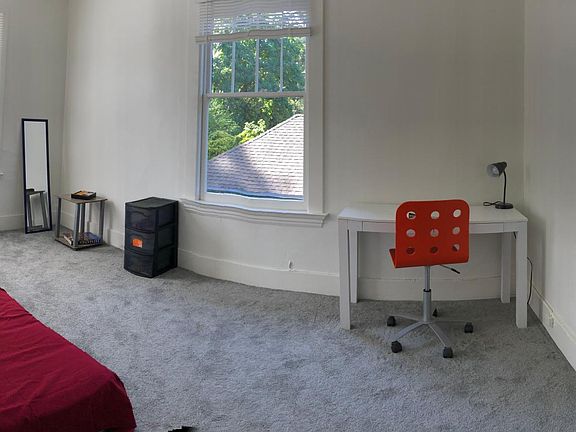 Bedroom with 2 big windows and closet.