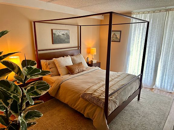 Large bedroom with access to the balcony, comes unfurnished.
