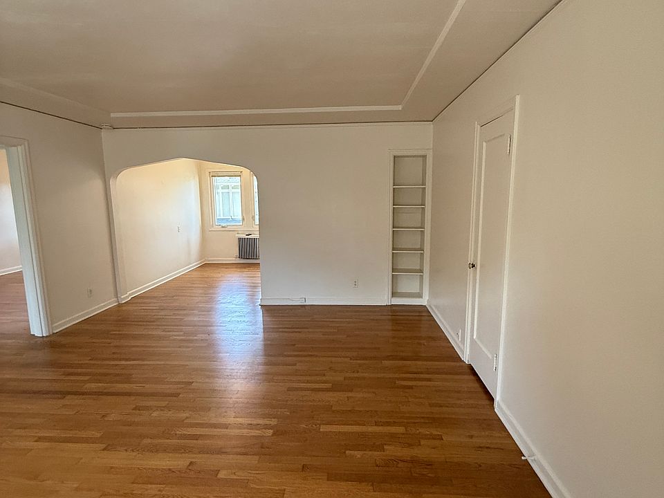 Living room w/ original built-ins.