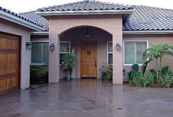 Mediterranean/Spanish Styling w/ custom wood garage & front doors