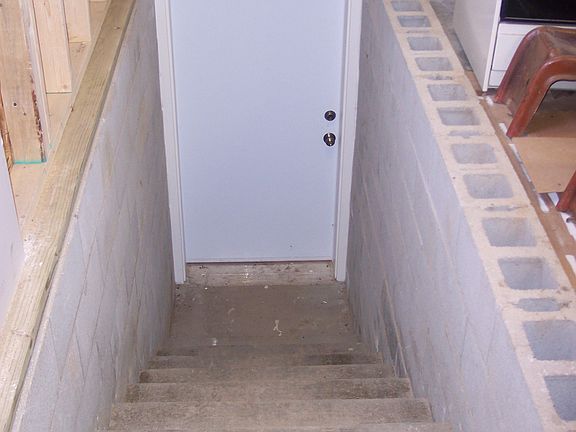 stairs to basement in garage
