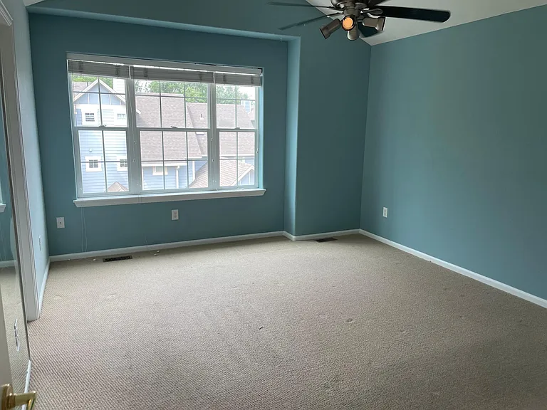 Master bedroom with bathroom and walk-in closet