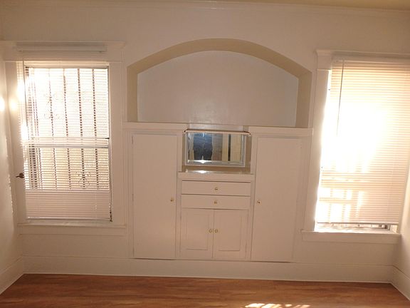 Cabinets and mirror in master bedroom