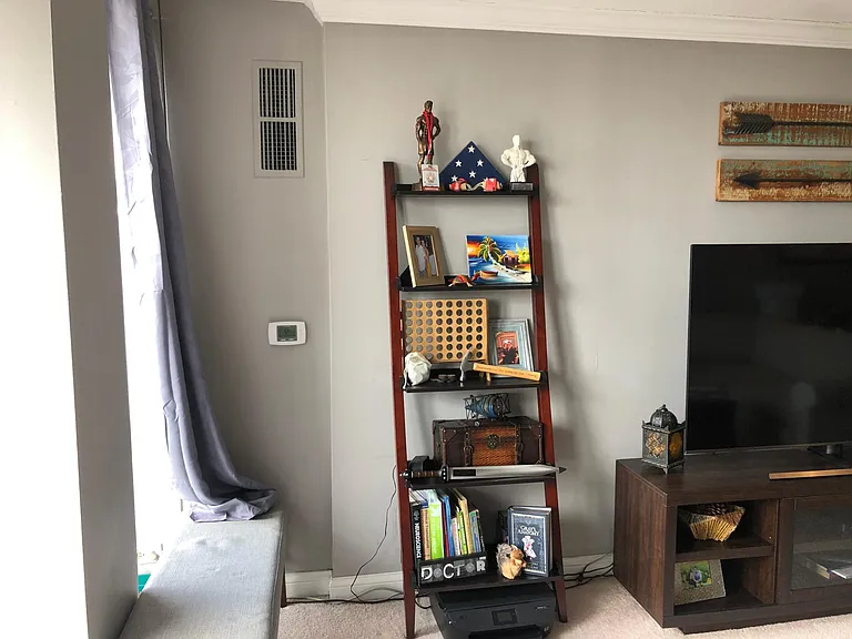 Living room opens into open balcony